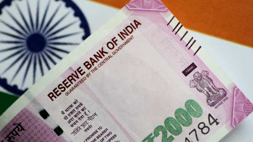 Rupee outlook: Indian currency to languish around 70 per $ a year from now, says poll