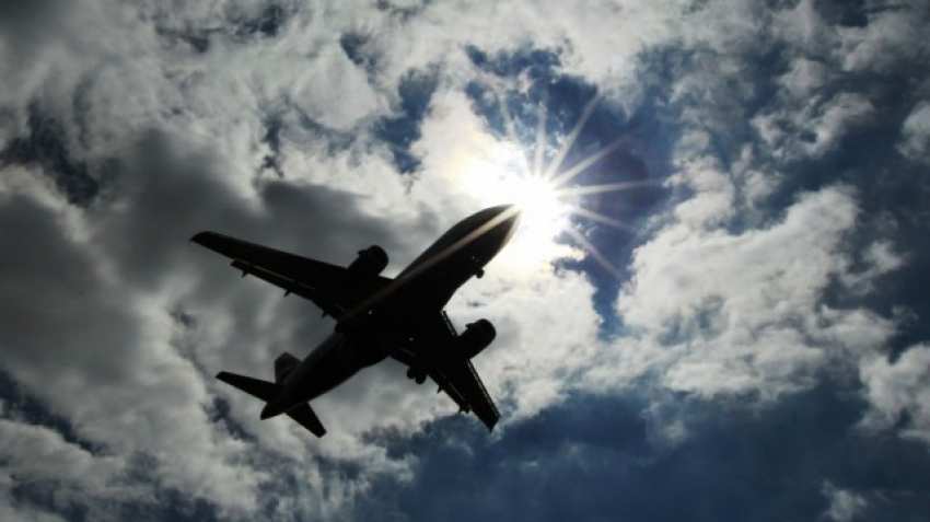 Flyers alert! Aviation disaster averted; this man tried to open plane's door in mid-air! Flyers alert! Aviation disaster averted; this man tried to open plane's door in mid-air!