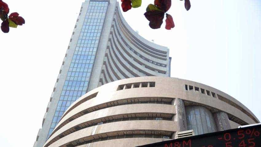 Sensex falls over 200 pts, Nifty slips below 11,000