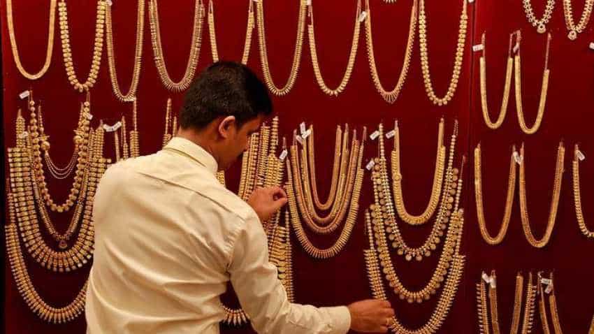 Gold remains higher on global cues, festive demand