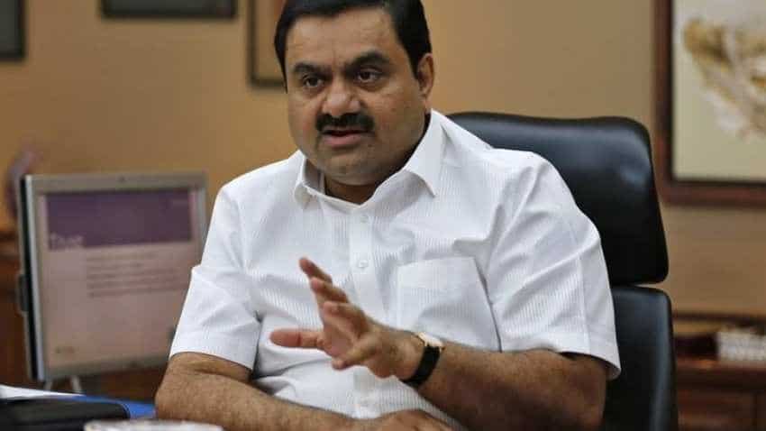 Adani, Total join hands to set up retail network, LNG terminal Adani, Total join hands to set up retail network, LNG terminal