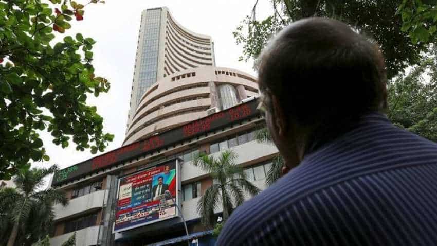 Global cues, rupee dent equity indices; Sensex down over 400 points