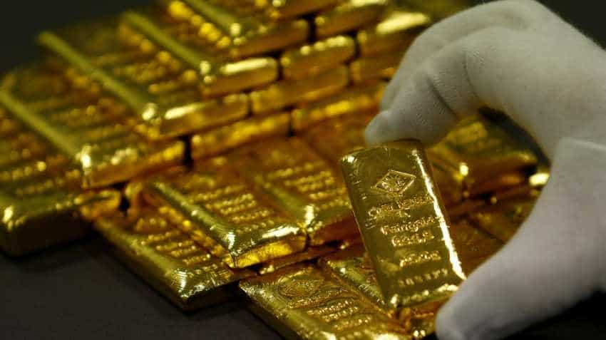 Gold firm as dollar dips after U.S. election