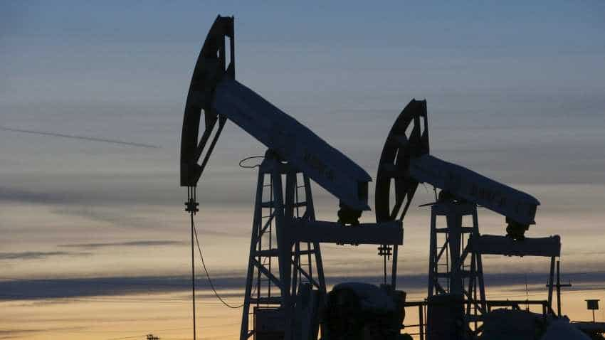 Oil rises as China reports record crude imports, but soaring US output caps gains