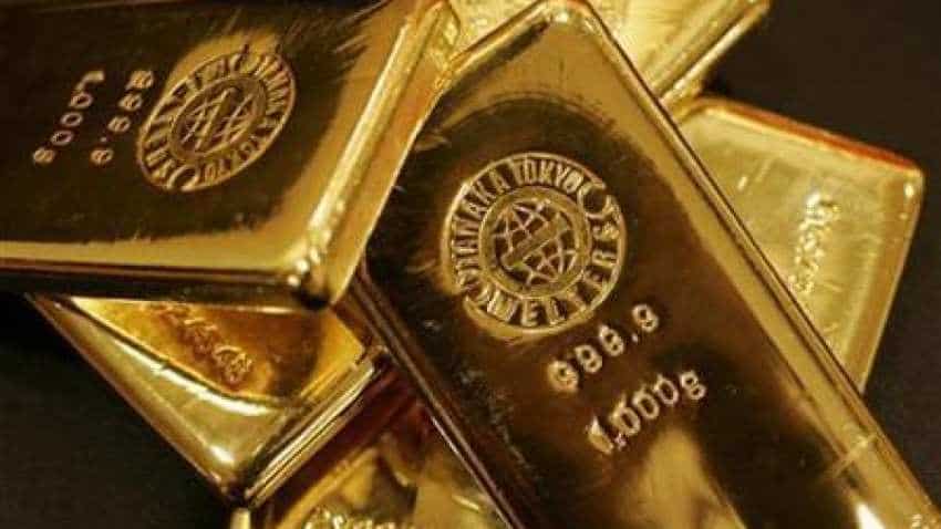 Gold hits one-week high as dollar softens; palladium near record