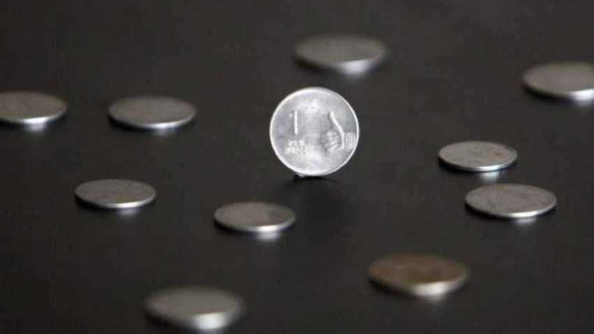 Rupee rises 14 paise to 71.82 against US dollar in early trade