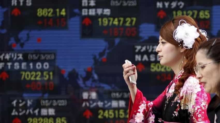 Global Markets: Asian shares hobbled by mounting risks to global growth