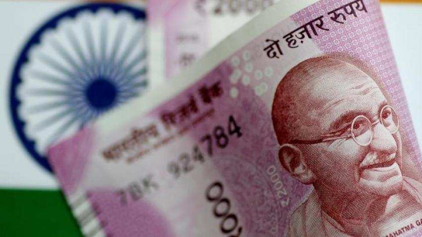 Indian Rupee settles 34 paise higher at 71.56 against US dollar 