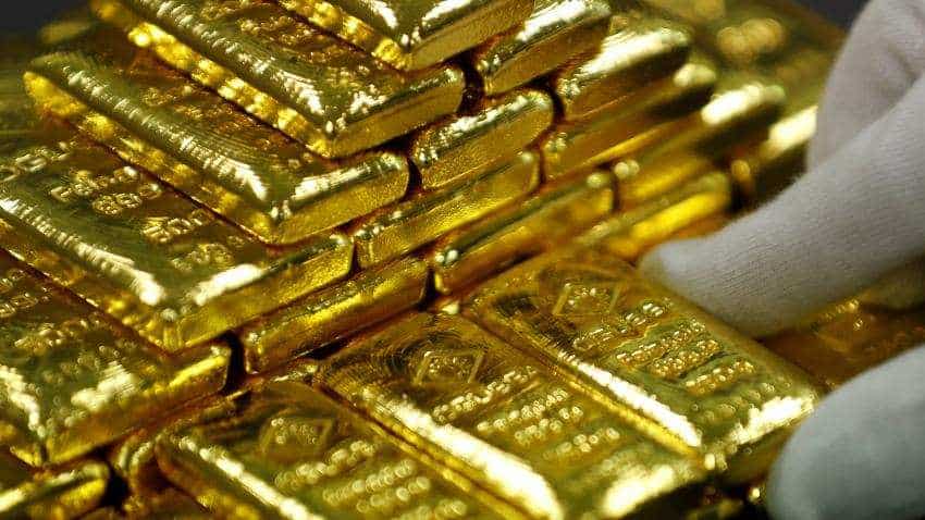 Gold hits six-month peak on stock sell-off, decelerating economy