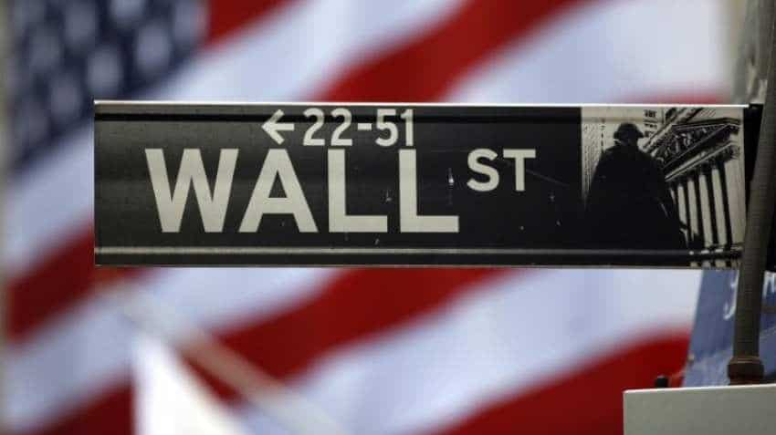 Wall Street shrugs off weak start to hold at one-month high