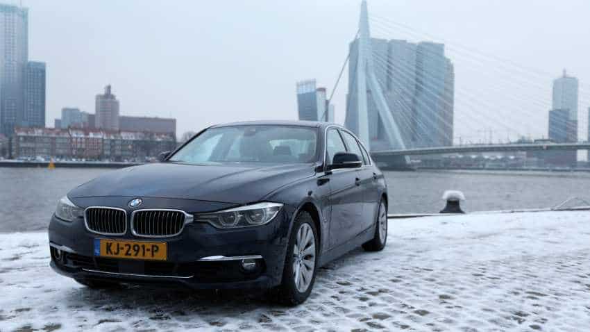 Seeking thrifty ways to cut pollution, Rotterdam links up with hybrid BMW owners