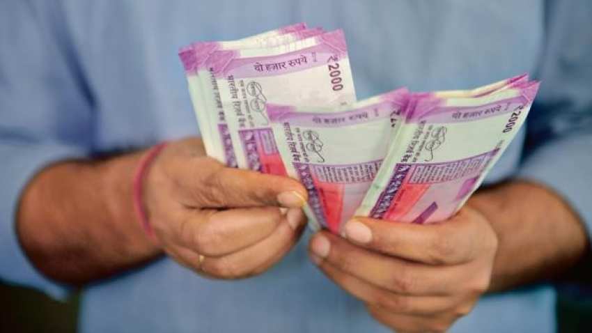 Rupee up by 9 paise against dollar in early trade