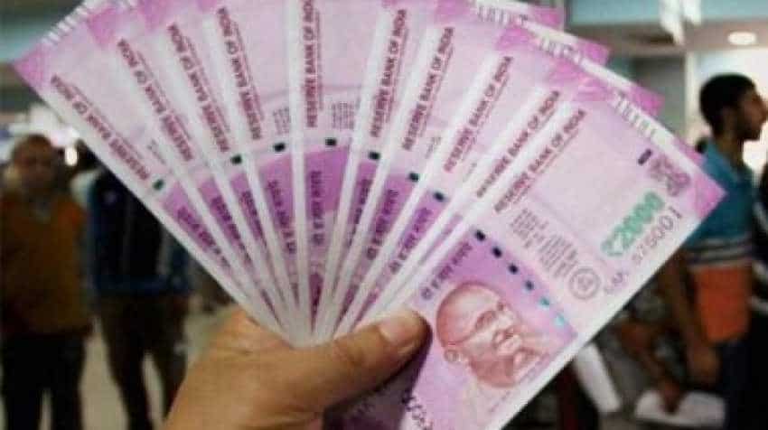Rupee falls 14 paise against US dollar in early trade