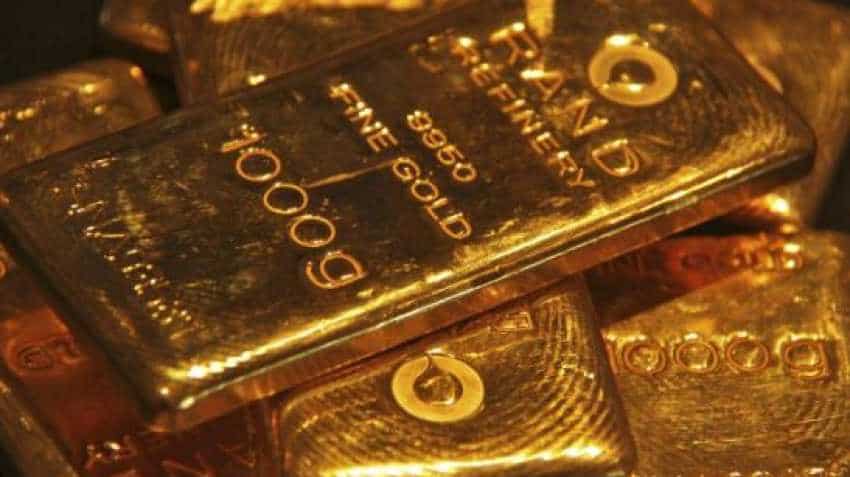 Gold futures up Rs 12 on global cues