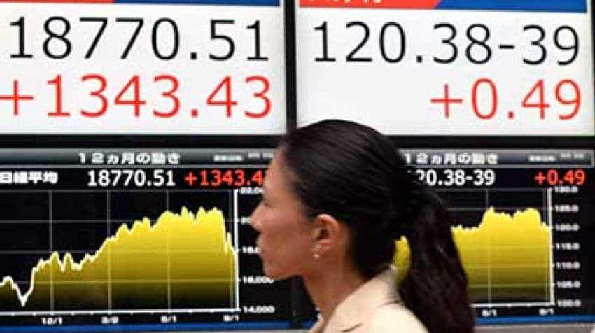 Global Markets: Asian stocks trade  cautiously at five-month peak