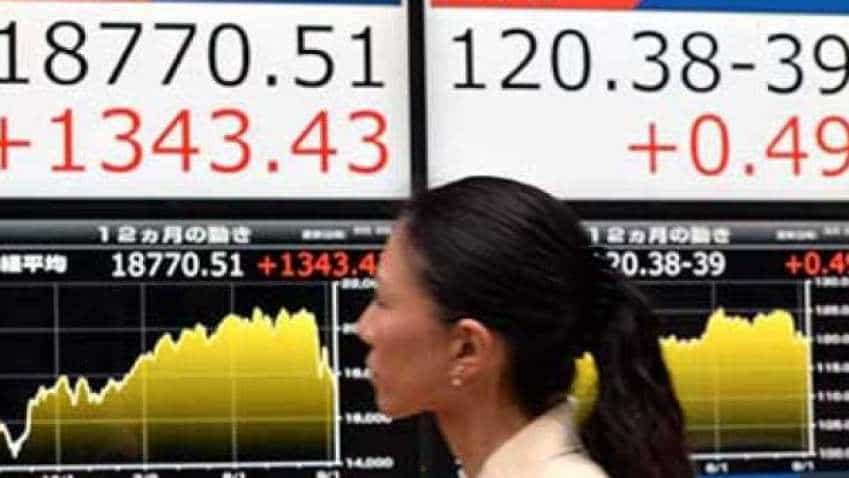Global Market: Asian stocks slip as trade optimism retreats, dollar holds gains