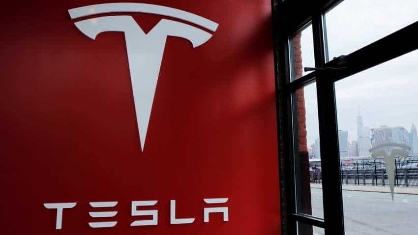 Tesla shares skid over 8 pct after first-quarter deliveries disappoint