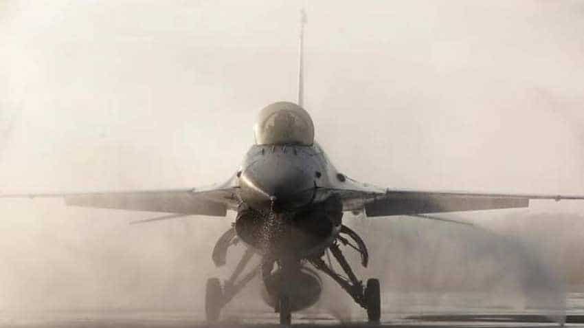 F-16 fighter jet crashes into California warehouse, pilot ejects