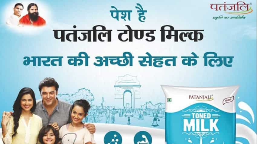 Baba Ramdev takes dig at Amul, Mother Dairy price hikes, launches cheaper Patanjali milk Baba Ramdev takes dig at Amul, Mother Dairy price hikes, launches cheaper Patanjali milk