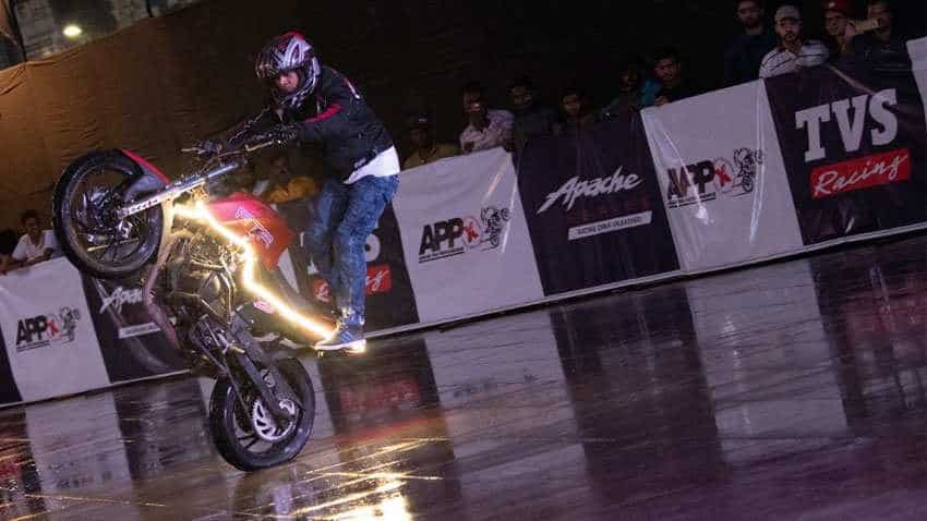 Record! TVS Apache enters Asia Book of Records with 6 hr non-stop stunt marathon amidst rainfall - SEE enthralling PICS