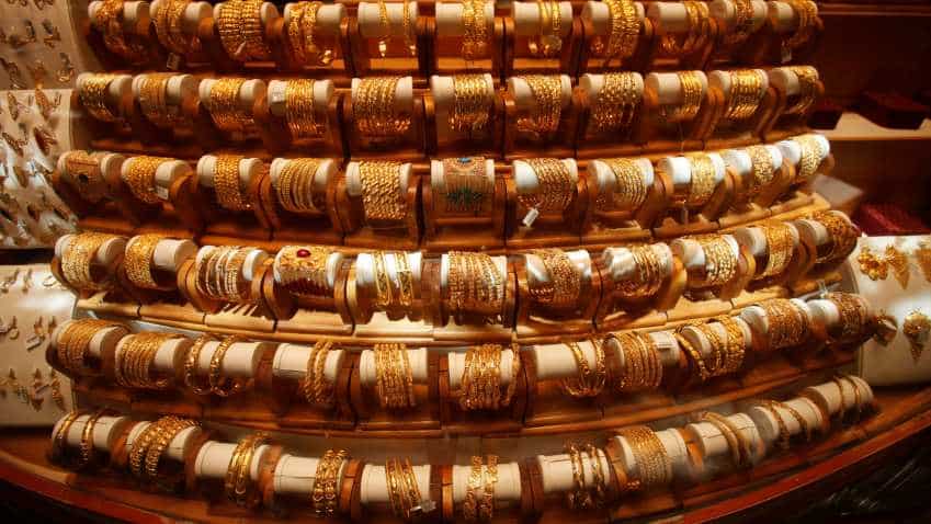 Gold prices dip over 1% as US Fed dashes rate-cut hopes; India&#039;s gold demand could fall fall 10% in 2019