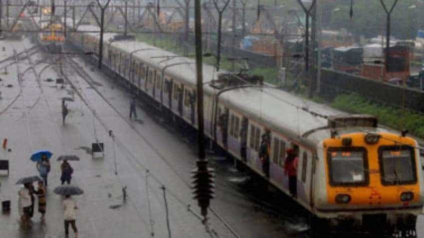 Mumbai rains hit road, rail and flight services; IMD forecasts wet spell set to continue Mumbai rains hit road, rail and flight services; IMD forecasts wet spell set to continue