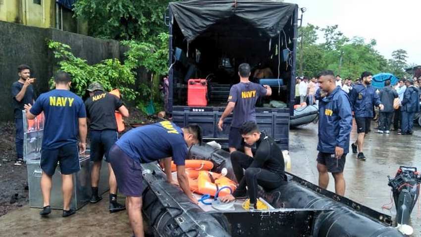 Mumbai weather today: Many passengers stranded at Lokmanya Tilak Terminus Railway Station, more rain expected; exams postponed Mumbai weather today: Many passengers stranded at Lokmanya Tilak Terminus Railway Station, more rain expected; exams postponed