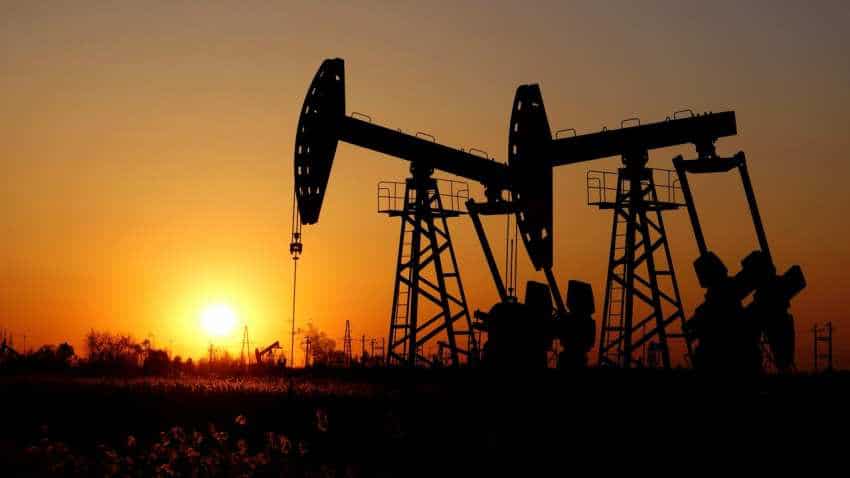 Oil slumps to seven-month low on global trade tensions, surprise US stock build