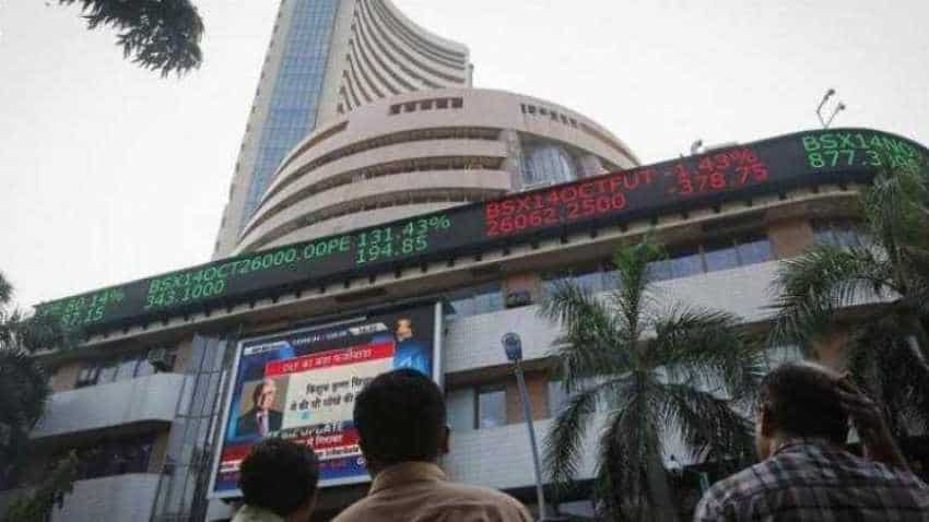 BSE stock exchange: Sensex dips on negative global bond yields; Nifty oscillates around 11,000 levels