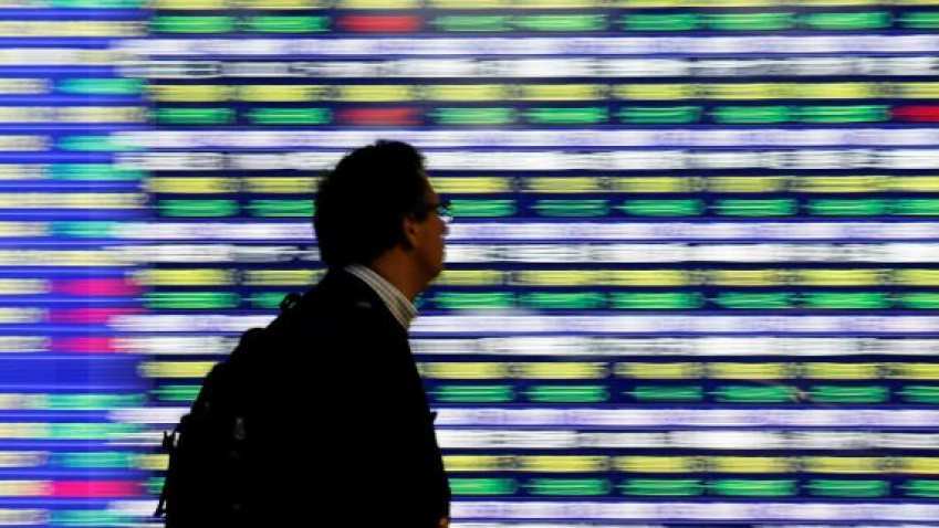 Global Markets: Asia stocks edge up as weak data lift stimulus hopes
