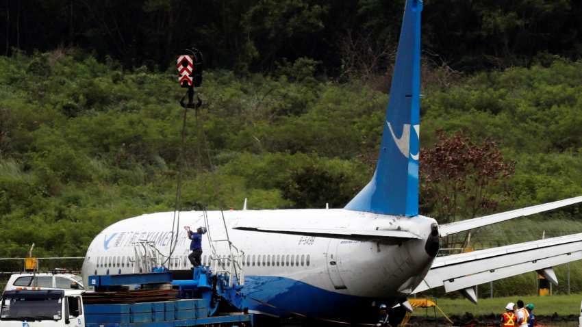 Stuff of nightmares! Woman opens plane&#039;s emergency exit door for &#039;fresh air&#039;