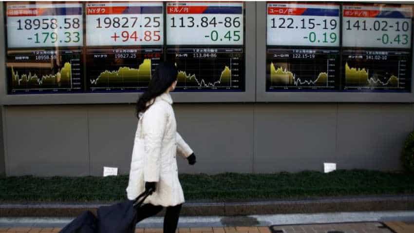 Global Markets: Asian shares edge up to three-month high, dollar marks time before Fed