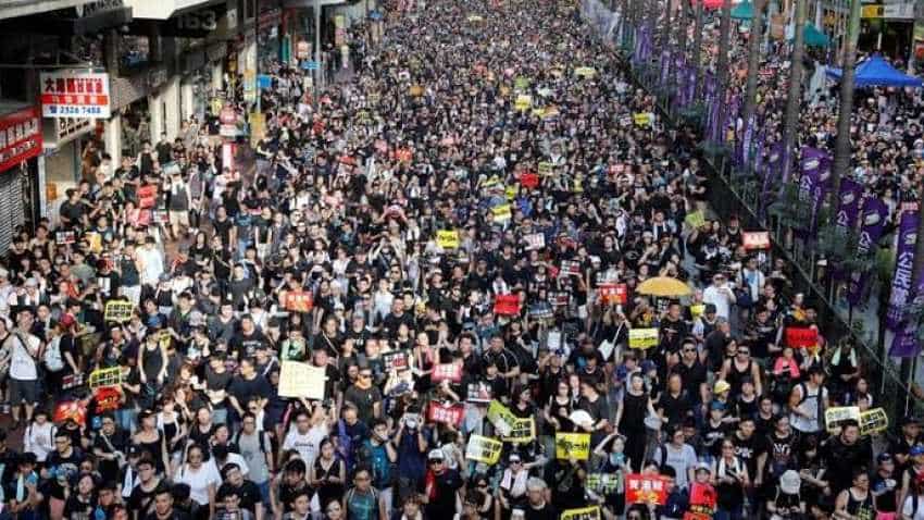 Hong Kong enters recession as media decry the treatment of journalists