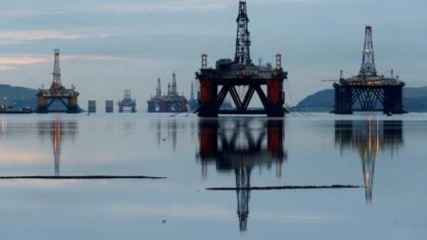 Oil drops as market awaits news on trade talks, oversupply concerns weigh