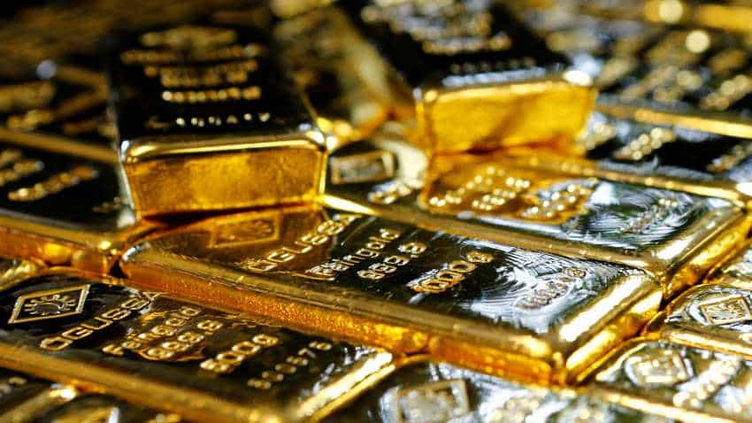 Gold price settles higher as US dollar, stocks fall