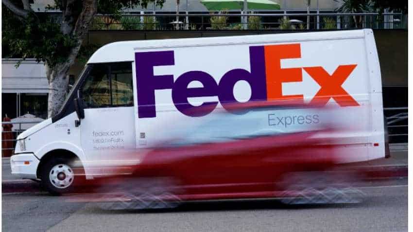 FedEx cuts 2020 profit forecast again as 7-day delivery costs weigh