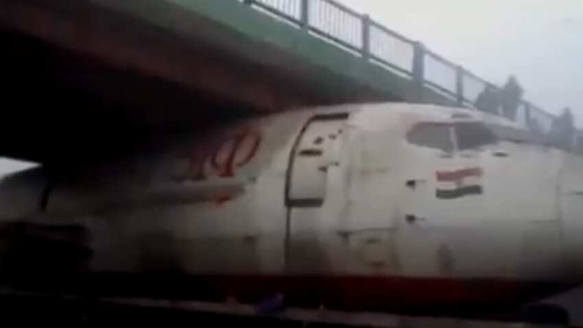 Airplane carried on truck gets stuck under Bengal bridge