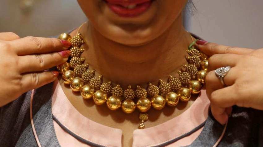 Gold price falls on cash run, markets await US stimulus