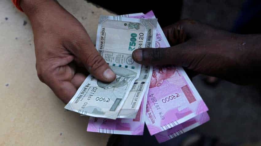 Rupee closes down by 9p at 75.72 against dollar on growth concerns
