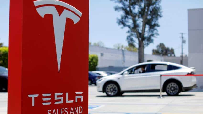 Elon Musk reopens Tesla factory, says come and arrest me Elon Musk reopens Tesla factory, says come and arrest me