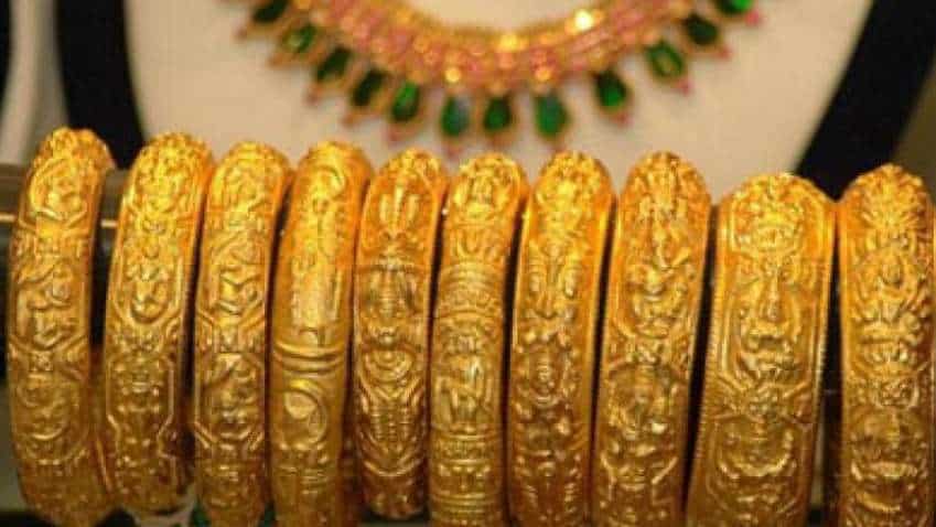 Gold price near 8-year high as virus cases surge
