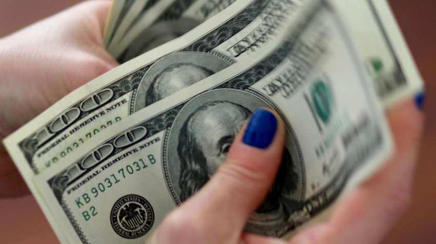 US dollar edges up as traders await Fed announcement