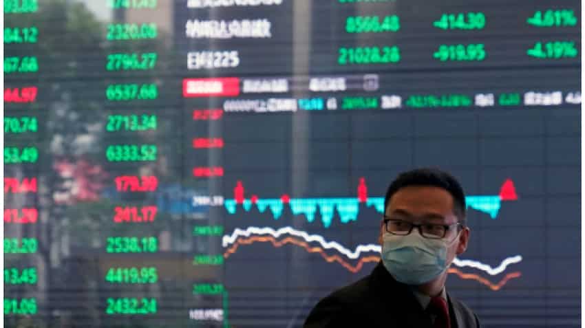 Asian shares pause near highs, eyes on U.S. yields
