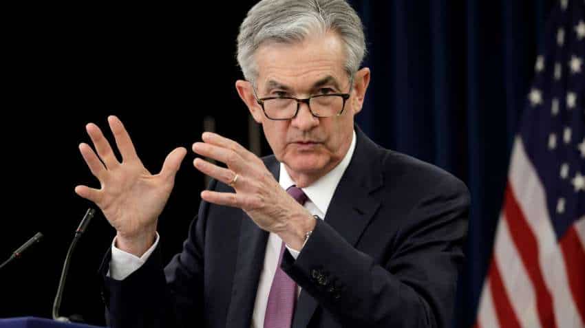 Fed touts economic recovery, vows to keep interest rates low Fed touts economic recovery, vows to keep interest rates low