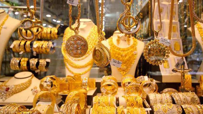 Gold plunges Rs 694; silver up Rs 126
