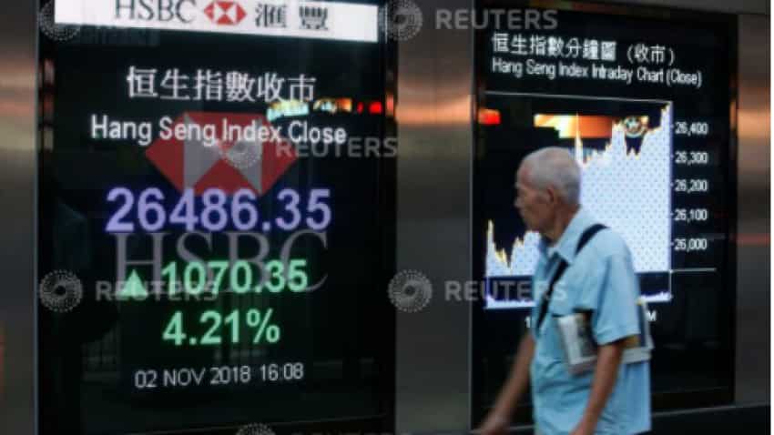 Asia shares near three-year high, bonds hold gains on U.S. gridlock bets