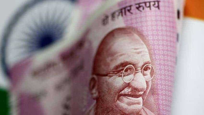 Rupee settles 7 paise lower at 74.15 against US dollar Rupee settles 7 paise lower at 74.15 against US dollar