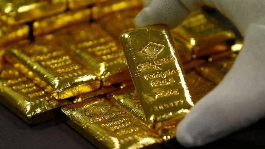 Gold price eases on higher Treasury yields, rebounding dollar