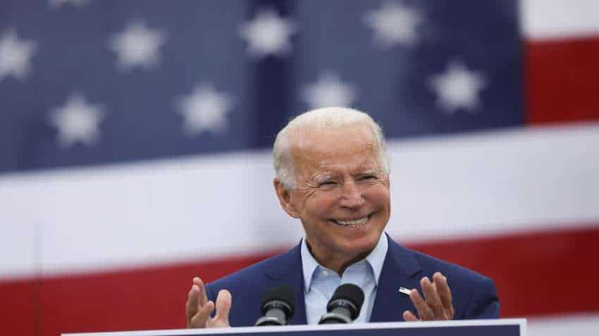 Biden says China to face repercussions on human rights