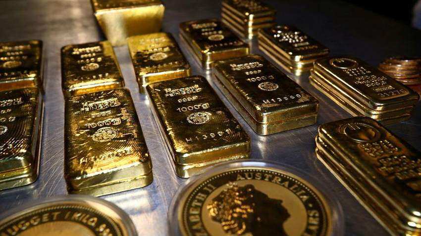 Gold hits lowest in more than seven months as rising yields dent appeal